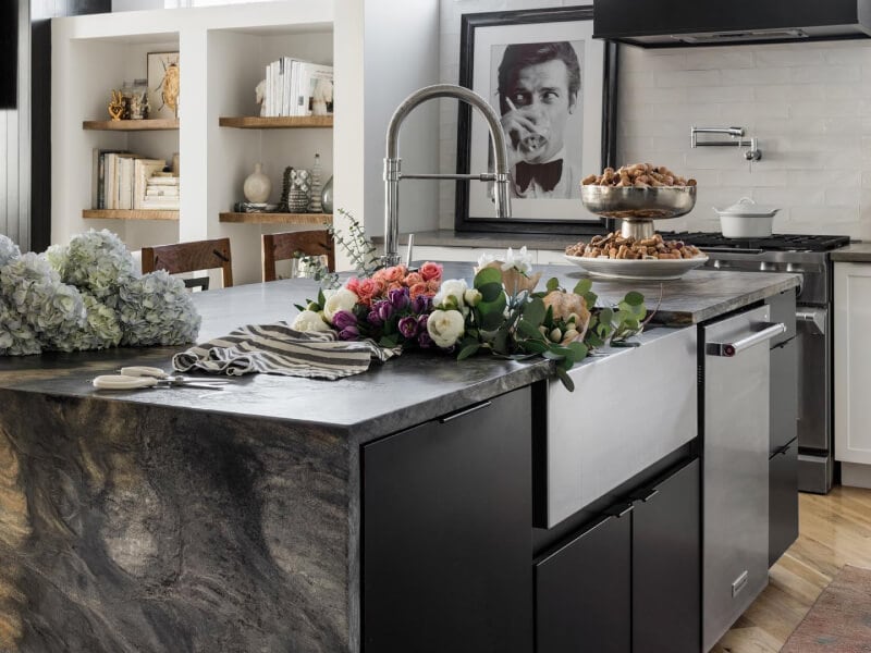 A kitchen island with a sink and dishwasher installed in it A kitchen island with a sink and dishwasher installed in it