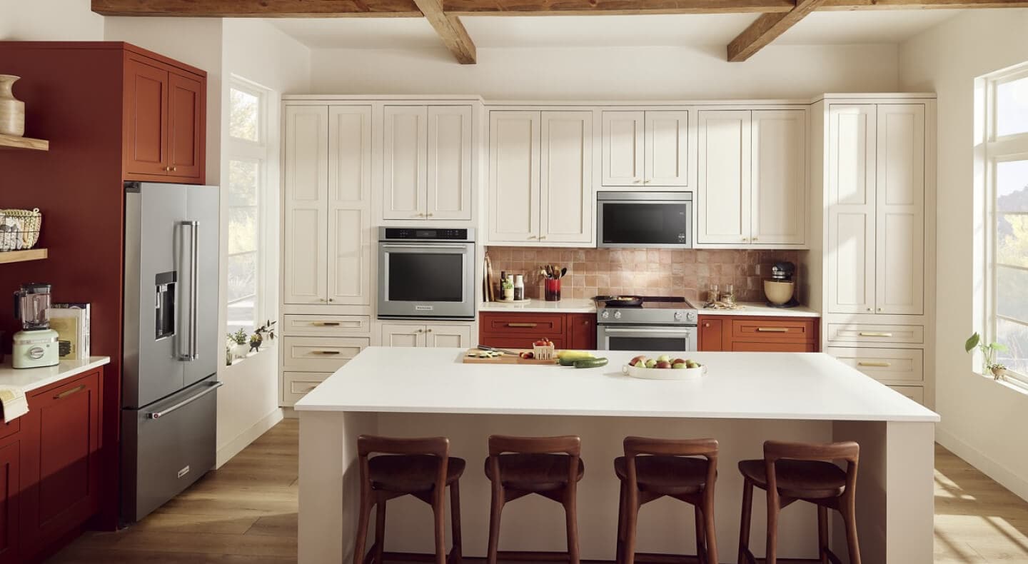 An L-shaped kitchen with an island An L-shaped kitchen with an island