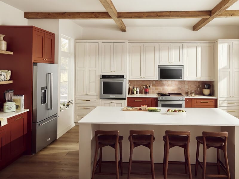 An L-shaped kitchen with an island An L-shaped kitchen with an island
