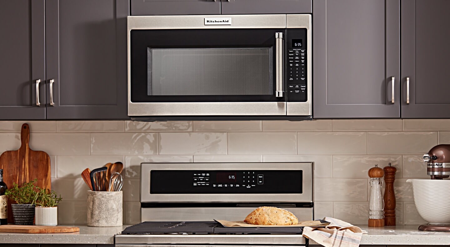 KitchenAid® over-the-range microwave in gray cabinetry