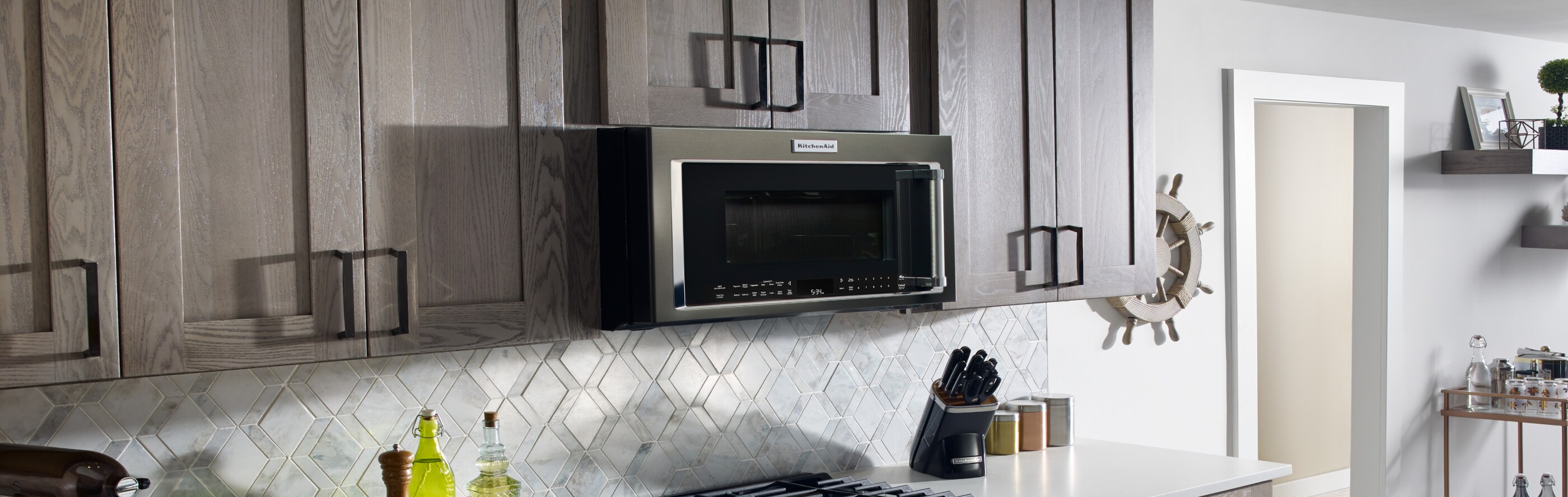 Wood cabinets and white countertop in kitchen