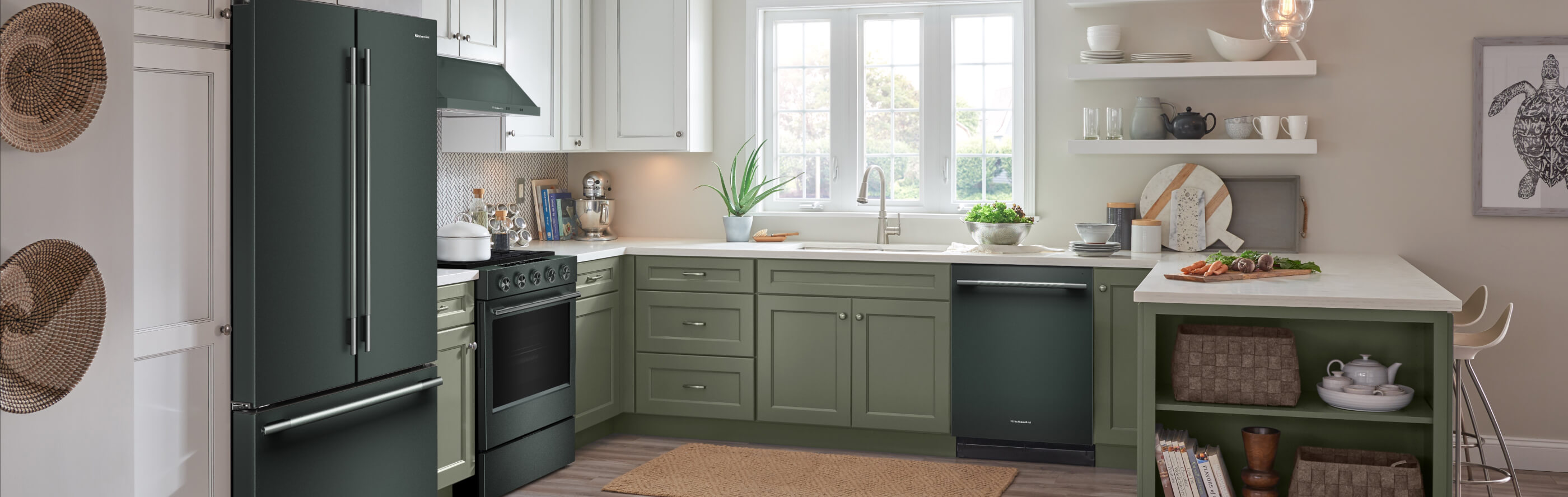 Kitchen with suite of KitchenAid® appliances in Juniper