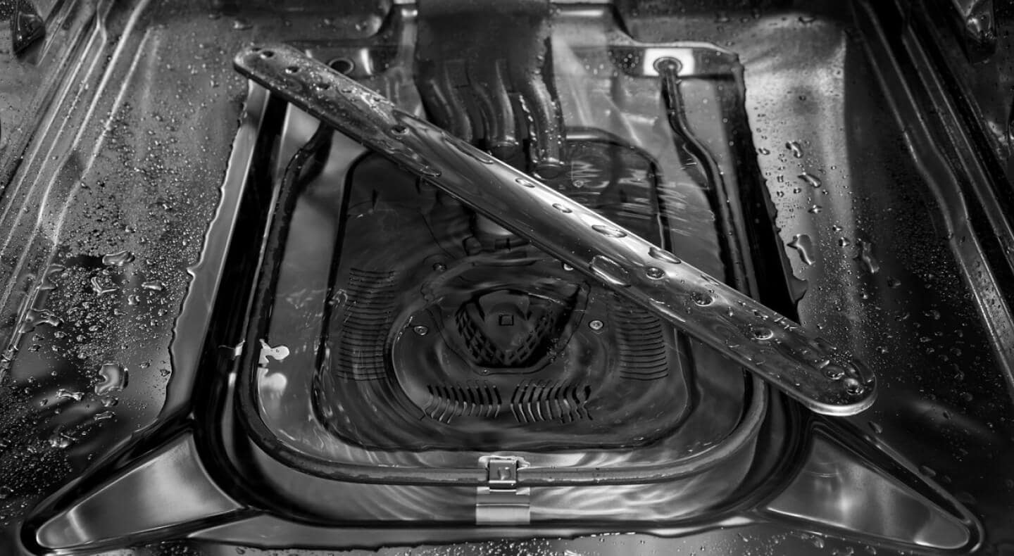 Inside of a dishwasher with water droplets Inside of a dishwasher with water droplets