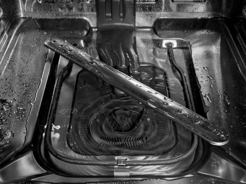 Inside of a dishwasher with water droplets Inside of a dishwasher with water droplets