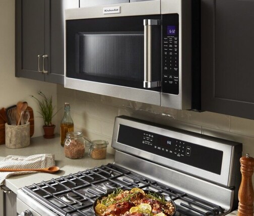 KitchenAid® microwave range hood over a freestanding range