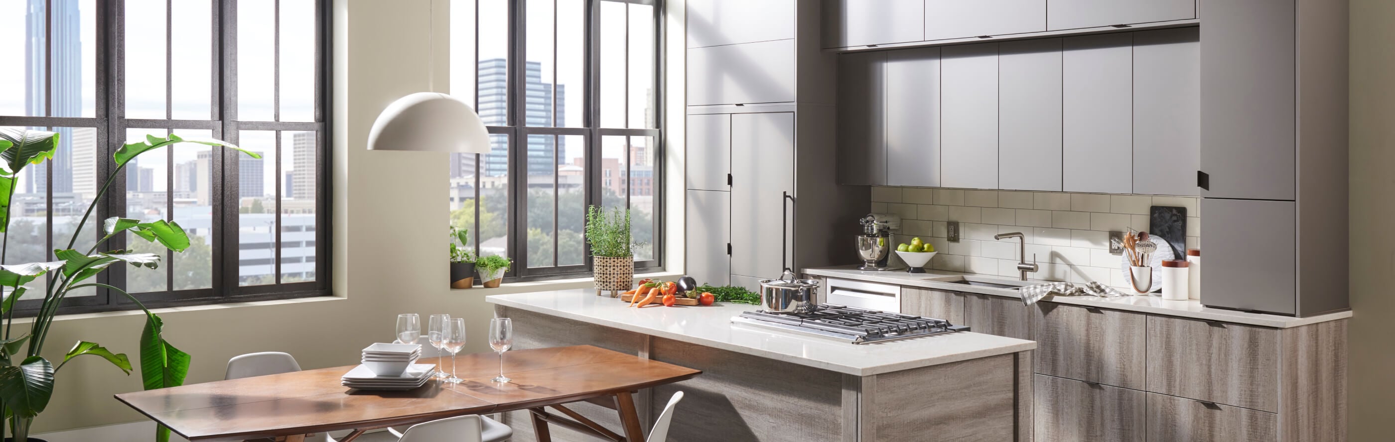 Modern kitchen with sleek cabinetry and KitchenAid® appliances