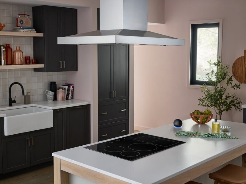 KitchenAid® cooktop in a white kitchen island countertop KitchenAid® cooktop in a white kitchen island countertop