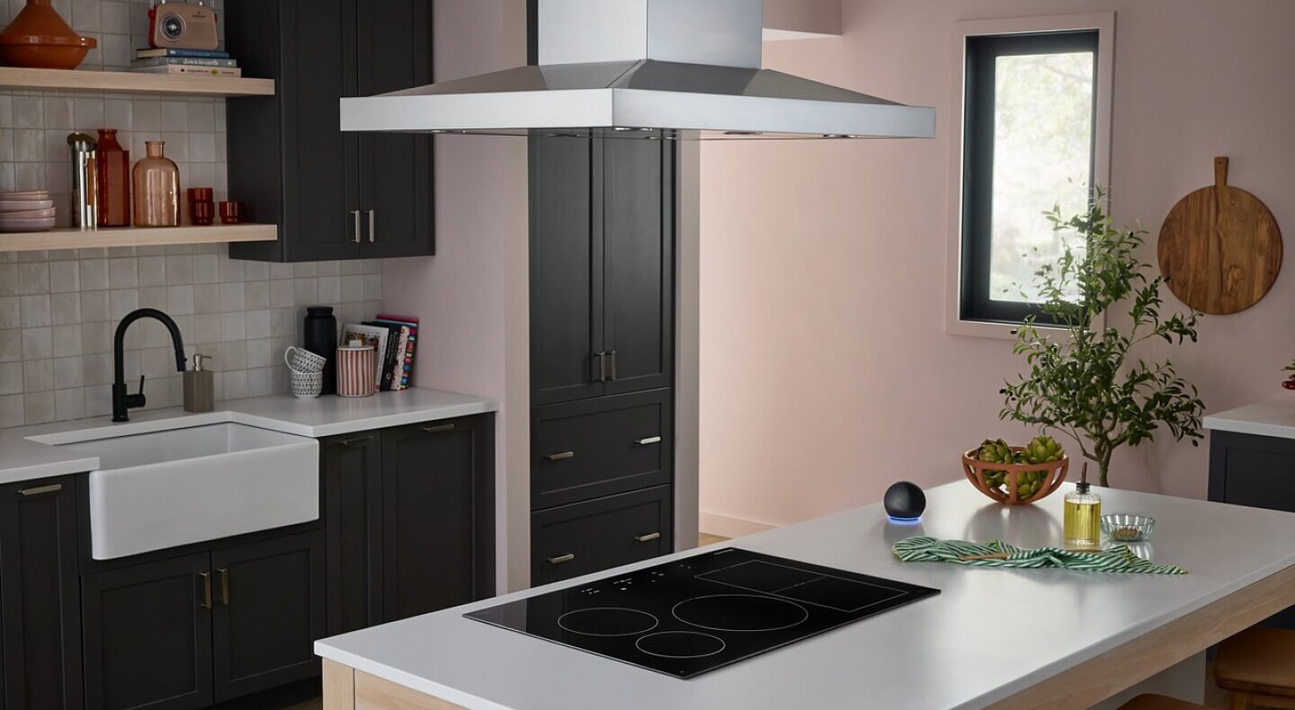KitchenAid® cooktop in a white kitchen island countertop KitchenAid® cooktop in a white kitchen island countertop