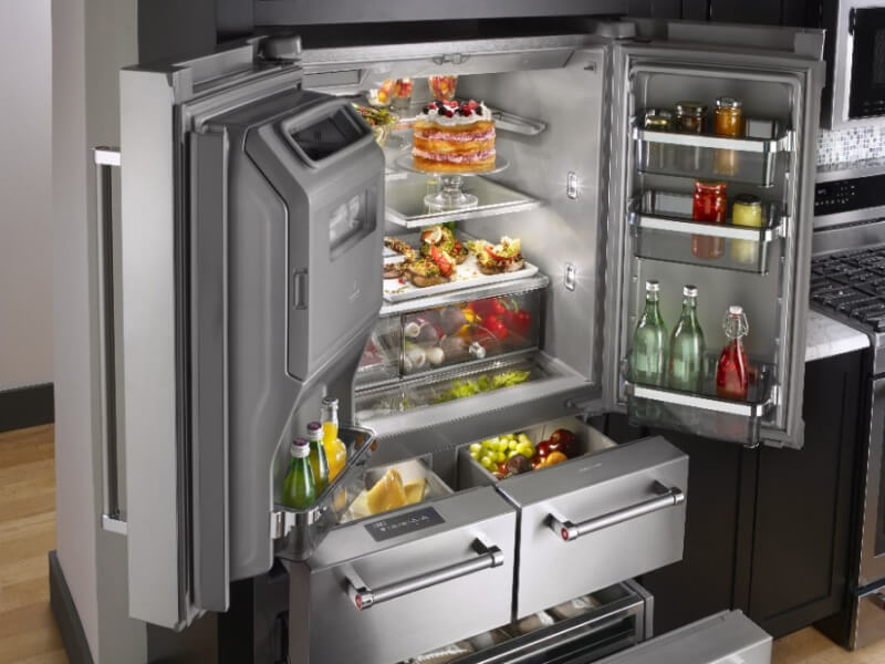 KitchenAid® multi-door refrigerator with all doors and drawers open