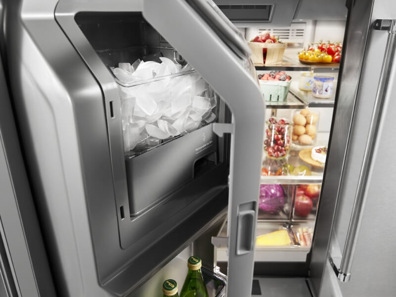 Close-up of in-door ice compartment in a KitchenAid® refrigerator
