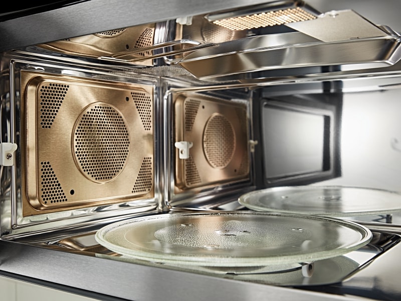 A closeup of the interior of a KitchenAid® microwave.