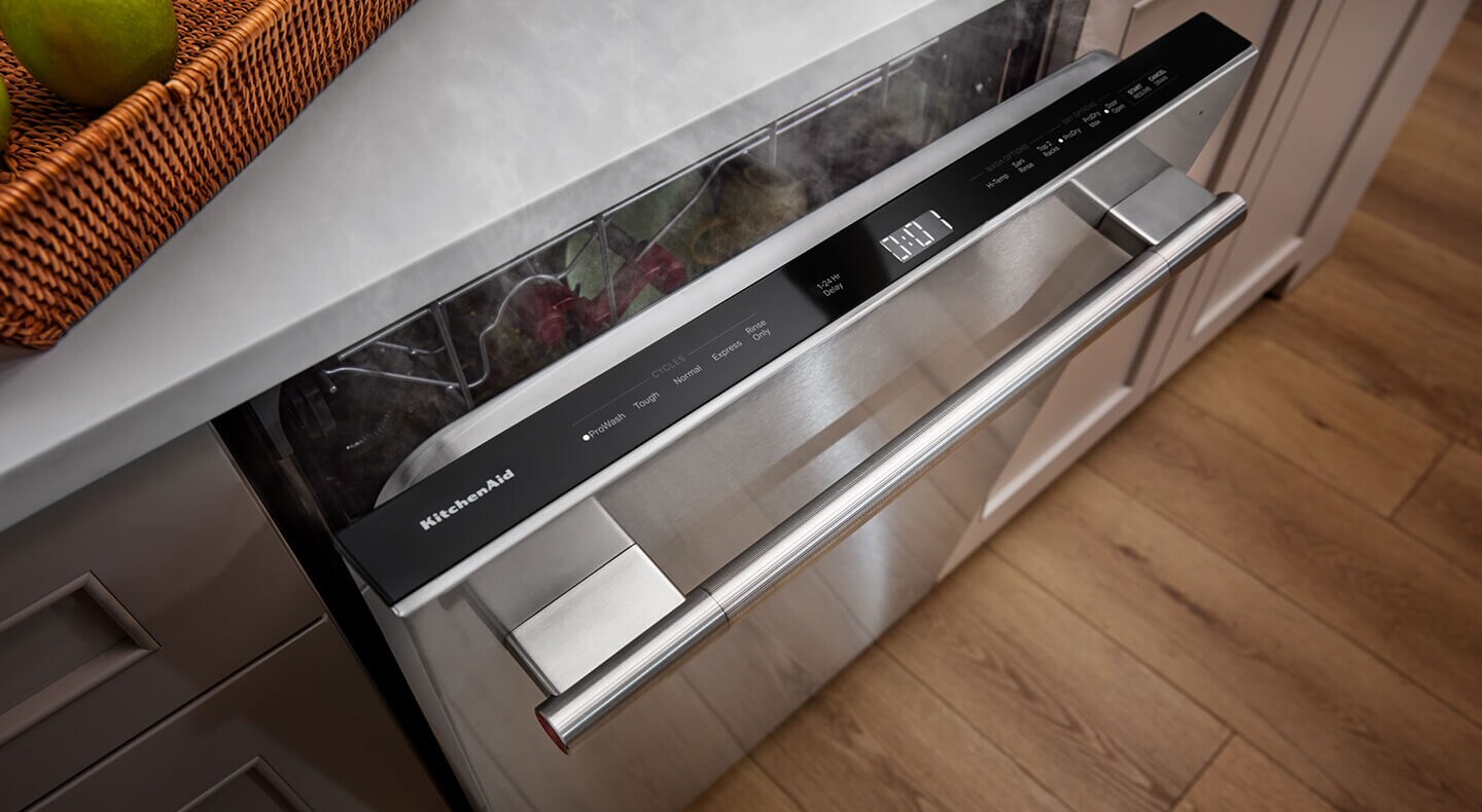 Top control dishwasher open and releasing steam