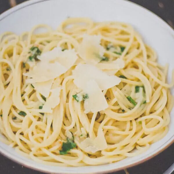 Pasta with slivers of cheese