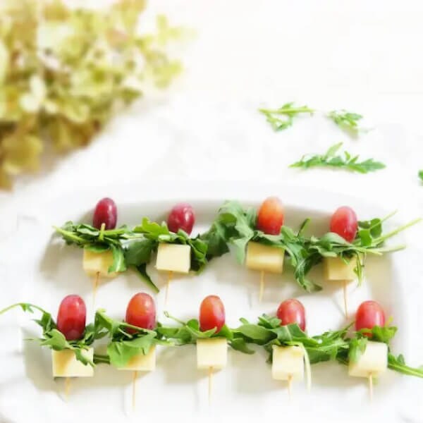 Grape, gouda and arugula skewers