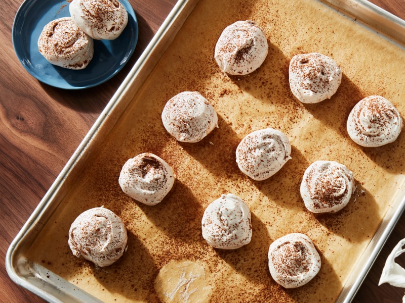 Meringue cookies topped with cocoa powder Meringue cookies topped with cocoa powder
