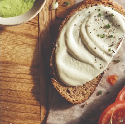 Horseradish mayo spread over wheat bread