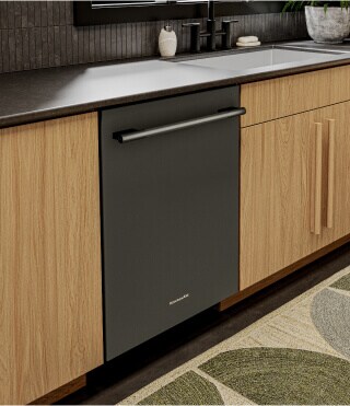 Top control dishwasher with towel bar handle