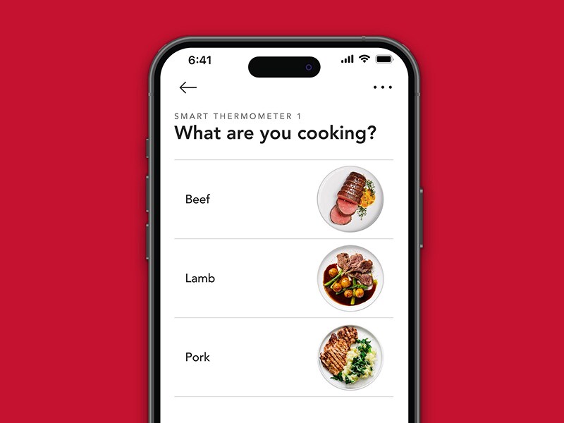 Image of a cell phone being used to manage cooking remotely