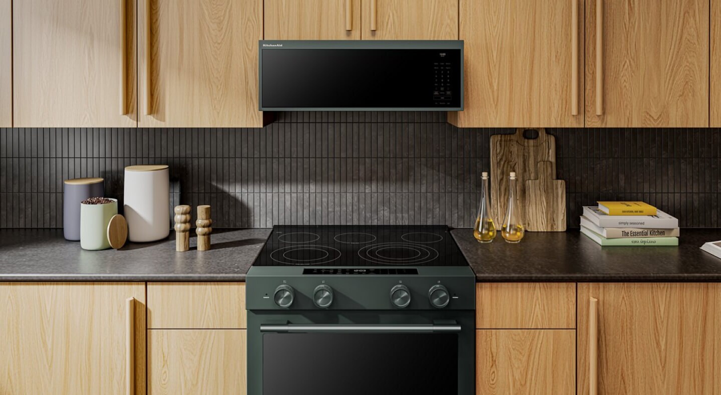 Juniper KitchenAid® electric range in natural wood cabinetry