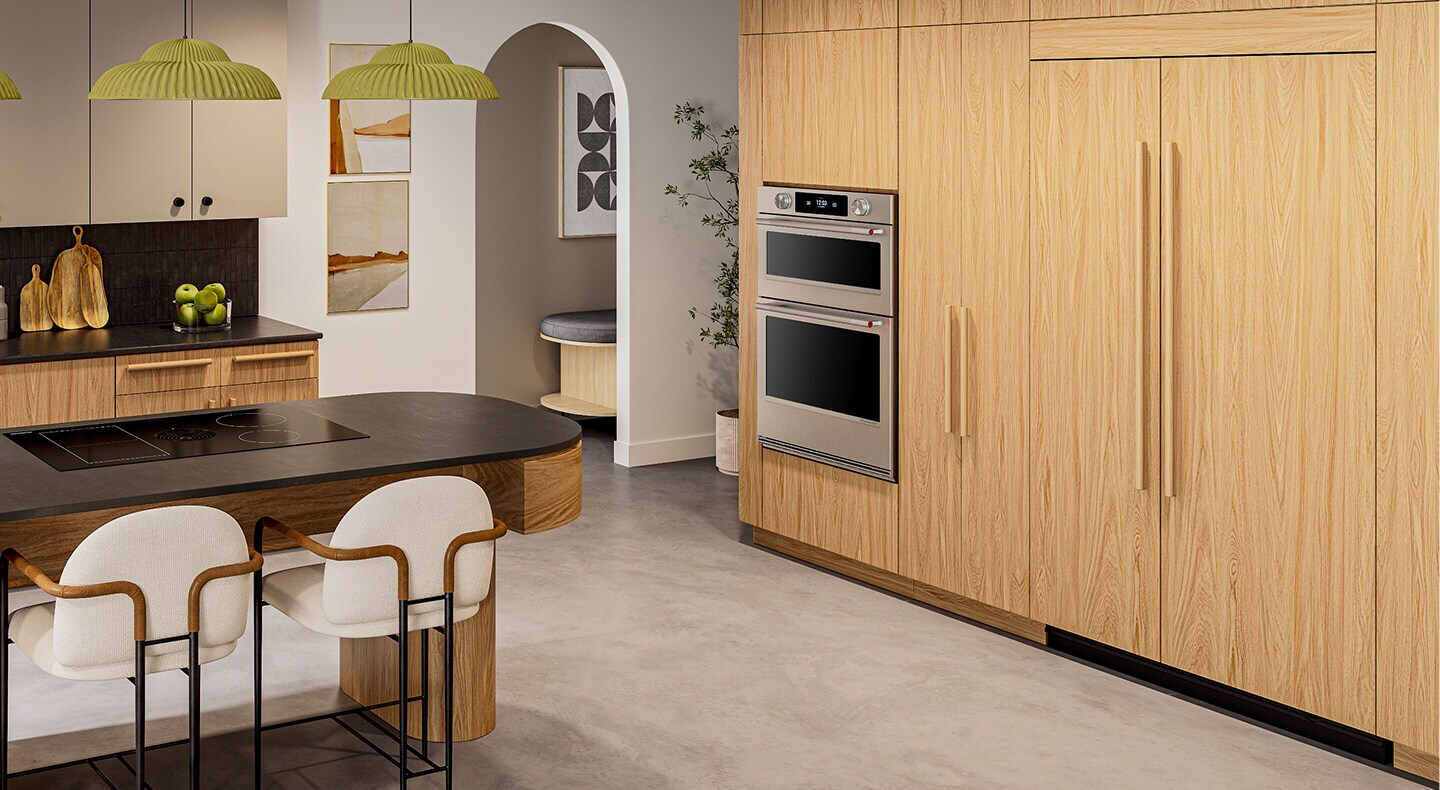 Panel-ready KitchenAid® side-by-side refrigerator blending with wood cabinetr