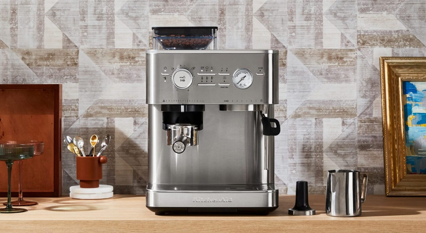 Silver KitchenAid® Semi Automatic Espresso Machine with Burr Grinder on countertop Silver KitchenAid® Semi Automatic Espresso Machine with Burr Grinder on countertop