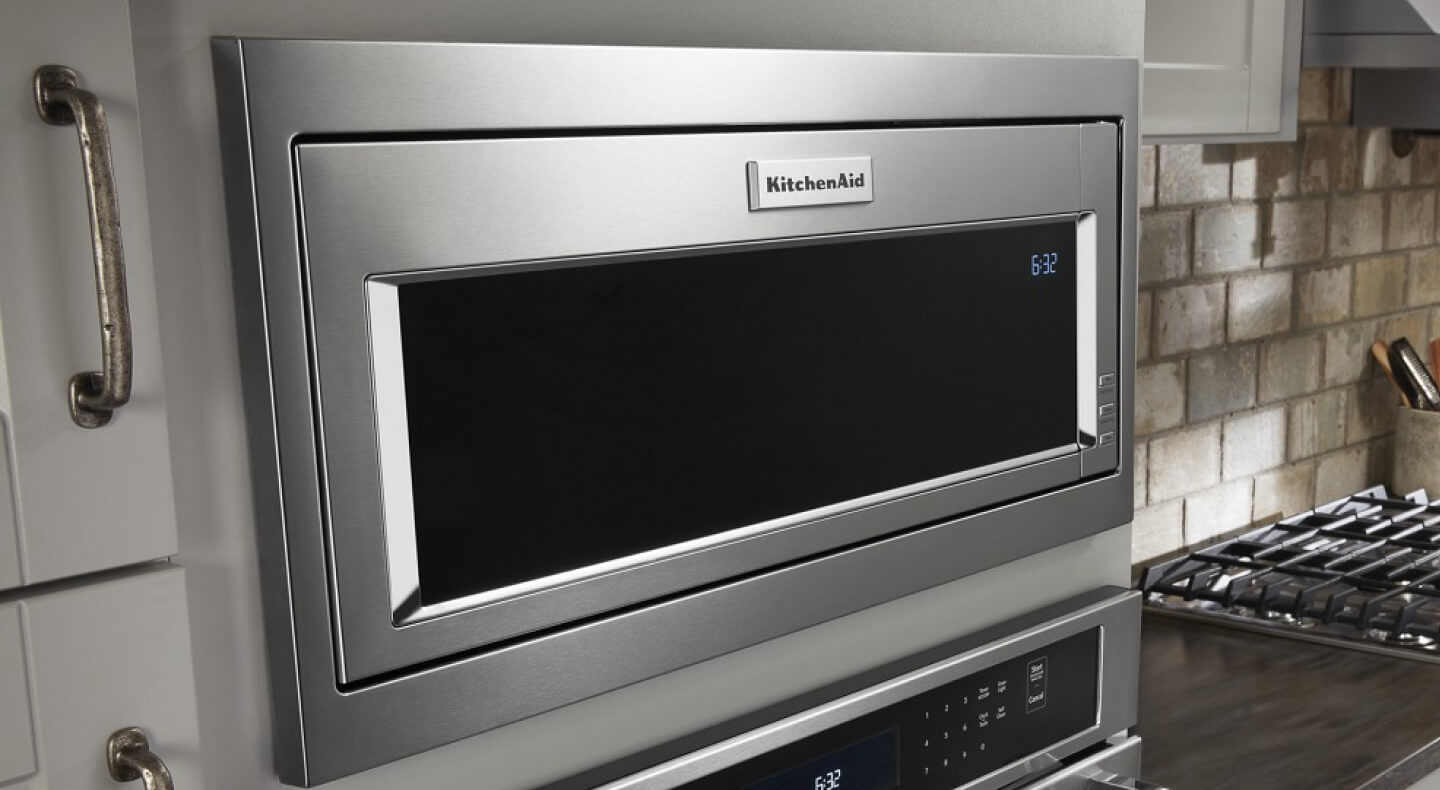 A built-in Kitchenaid® microwave above a wall oven A built-in Kitchenaid® microwave above a wall oven
