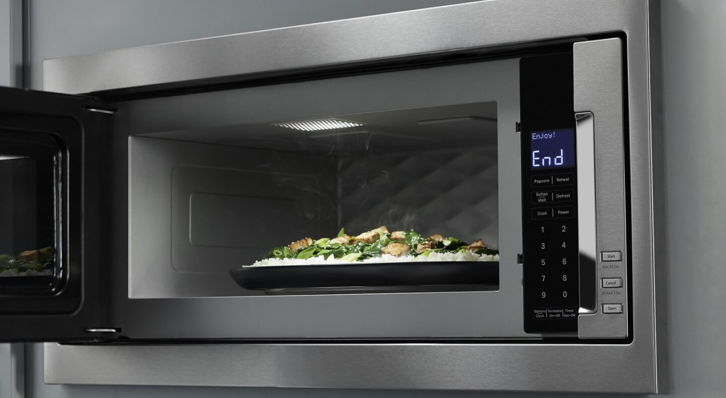 Food in a microwave with the door open Food in a microwave with the door open