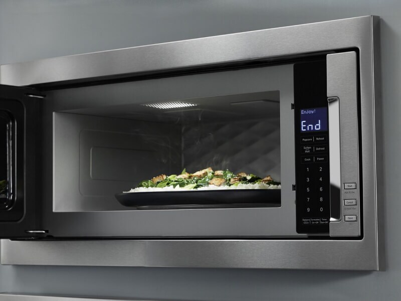 Food in a microwave with the door open Food in a microwave with the door open