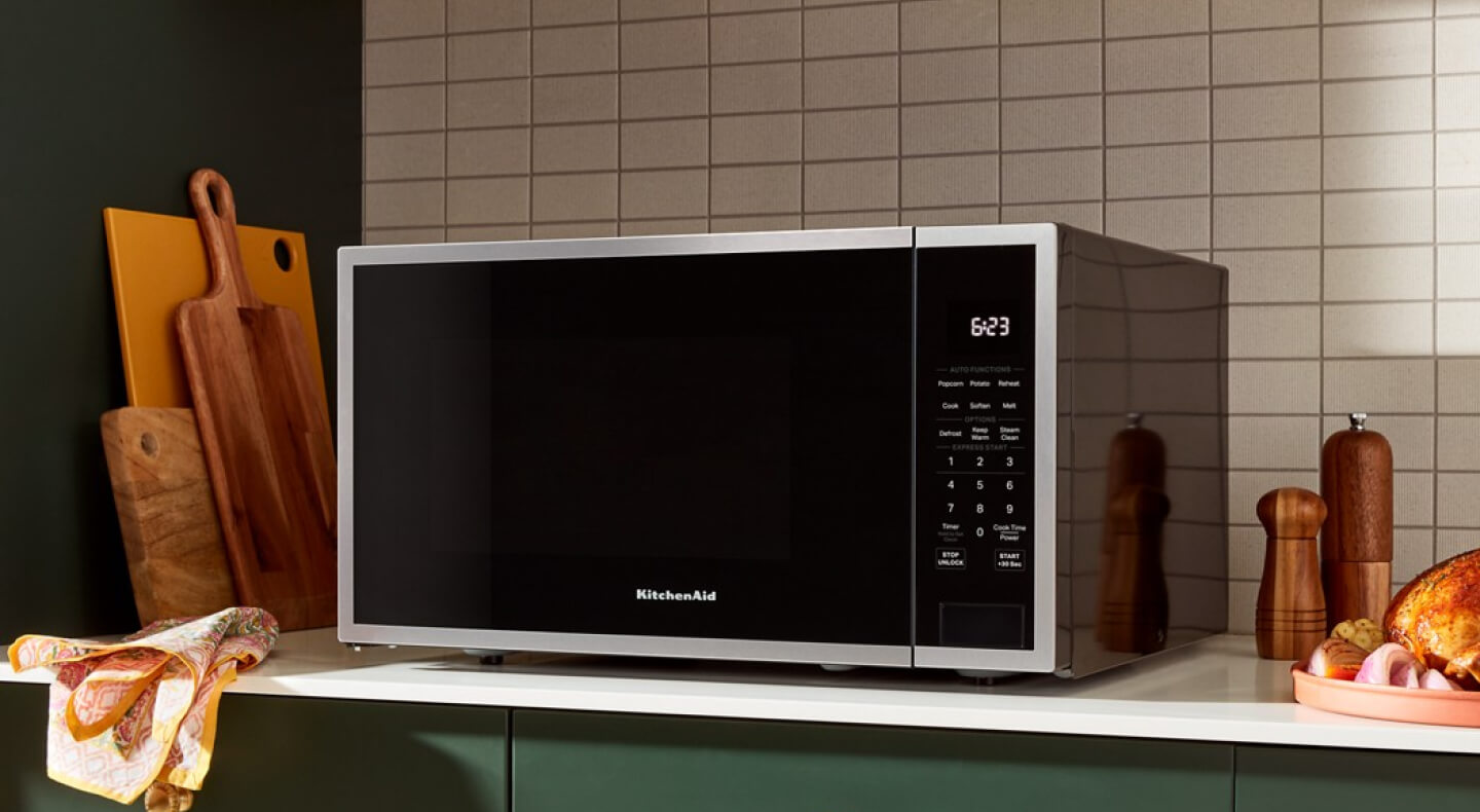 A KitchenAid® countertop microwave on a counter A KitchenAid® countertop microwave on a counter