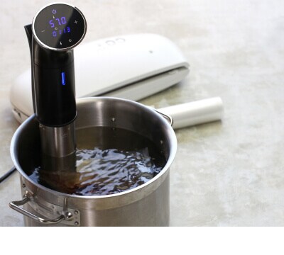Pot of water with circulator tool in it