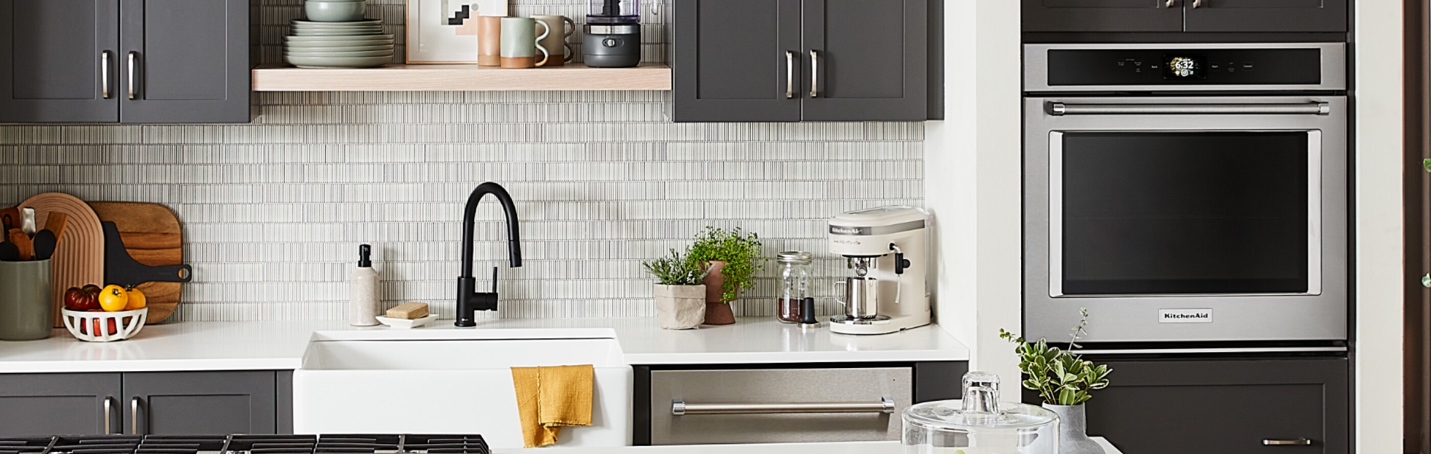 Stainless steel KitchenAid® single wall oven in dark gray cabinetry