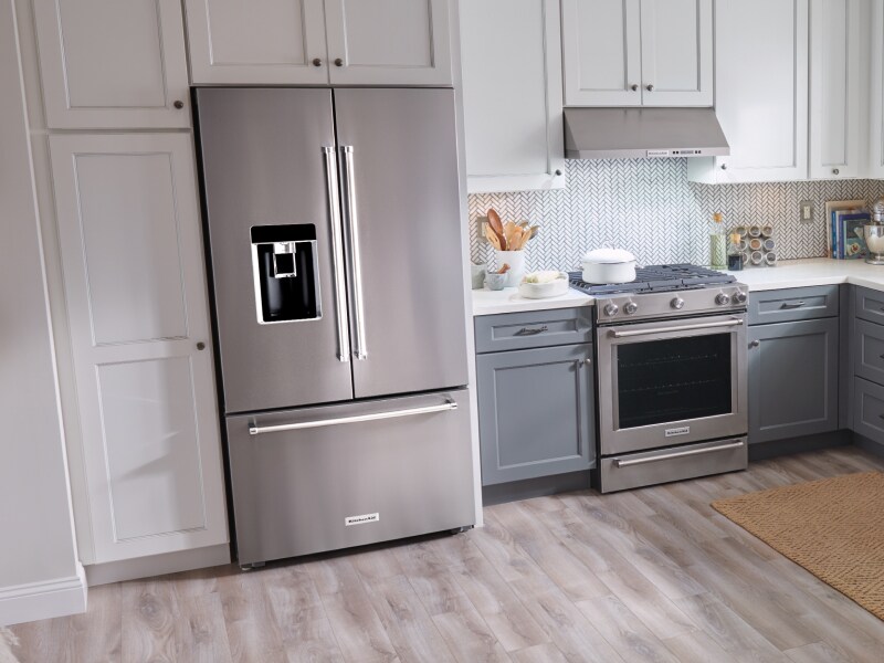 Stainless steel, KitchenAid® French-door refrigerator in white cabinetry Stainless steel, KitchenAid® French-door refrigerator in white cabinetry