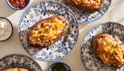 Twice Baked Potatoes on blue patterned plates.