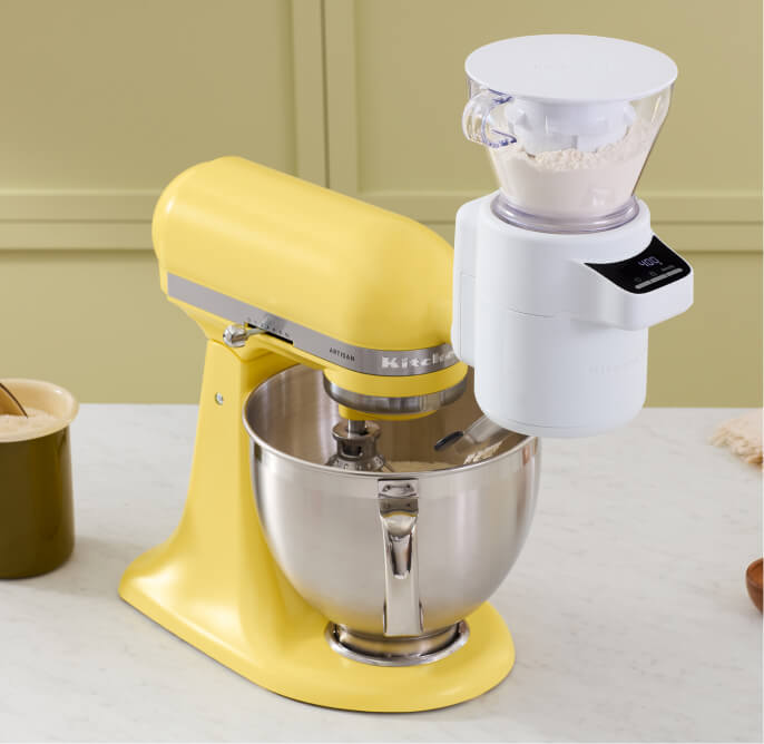 The Butter stand mixer with the flour sifter attachment.