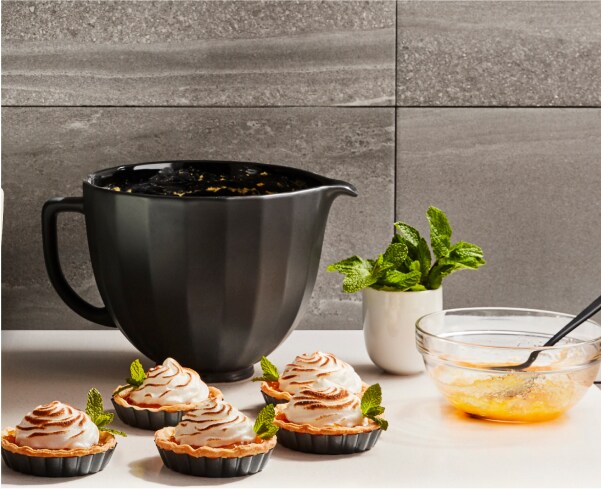 A KitchenAid Stand Mixer Bowl with several completed tarts