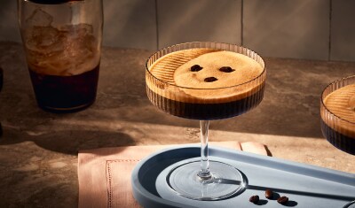 Espresso martini garnished with espresso beans
