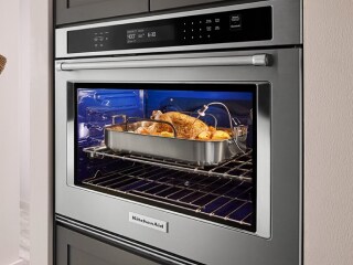 A dish inside a KitchenAid® wall oven