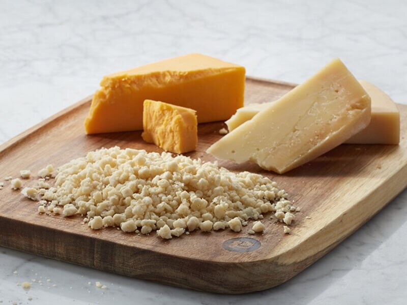 Cheeses on a cutting board