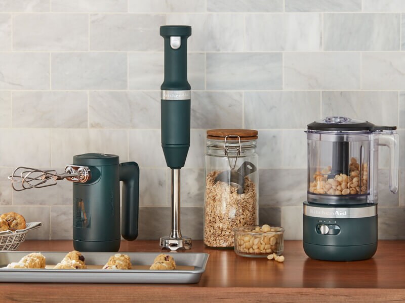 KitchenAid® black cordless hand mixer, hand blender and food chopper on a countertop KitchenAid® black cordless hand mixer, hand blender and food chopper on a countertop