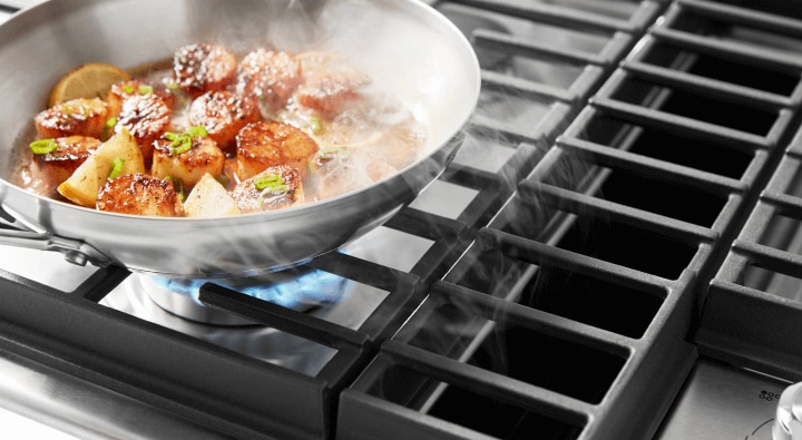 Food cooking on a cooktop Food cooking on a cooktop