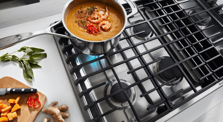 Food cooking on a gas cooktop