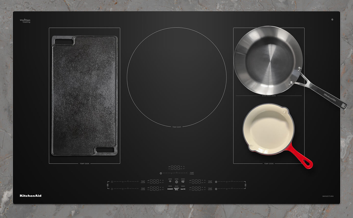 An induction cooktop with cookware arranged on it