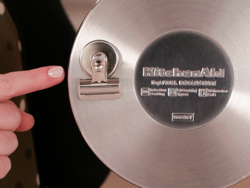 A magnet sticking to the bottom of a pot