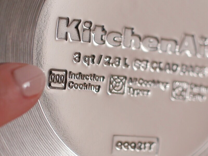 An induction symbol on the bottom of a pan