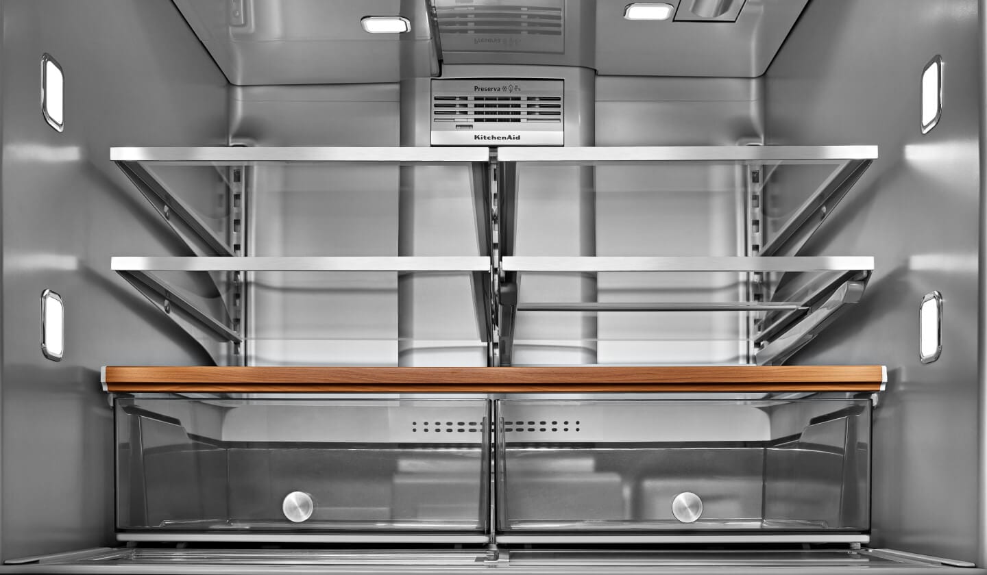The inside of a well-lit KitchenAid® refrigerator  The inside of a well-lit KitchenAid® refrigerator