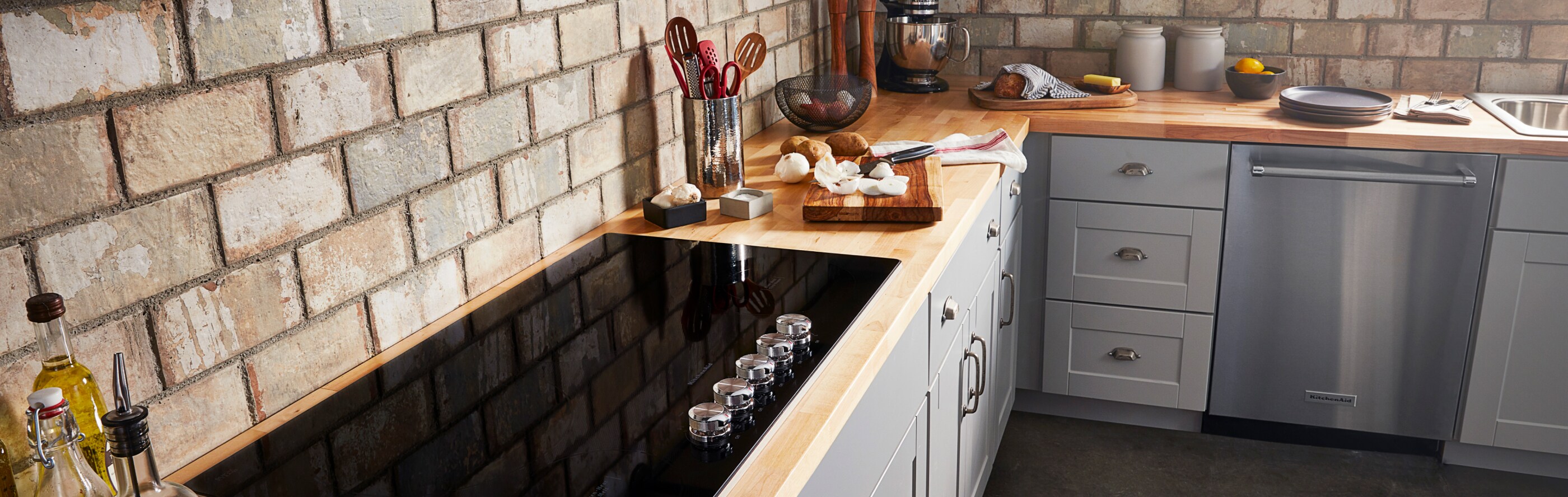 A black electric cooktop on a countertop