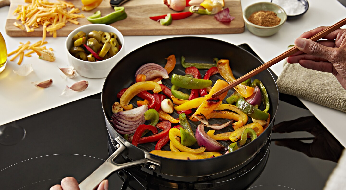 Cooking vegetables in a pan