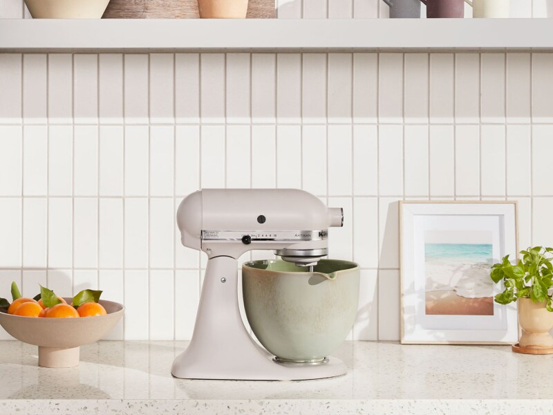 KitchenAid® stand mixer with green ceramic bowl on countertop KitchenAid® stand mixer with green ceramic bowl on countertop