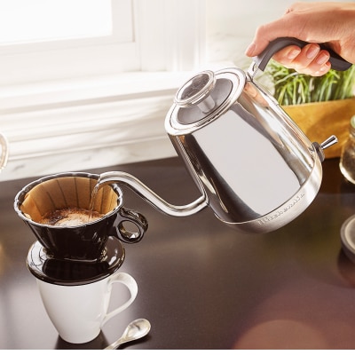 Stainless steel KitchenAid® goose-necked kettle brewing pour-over coffee