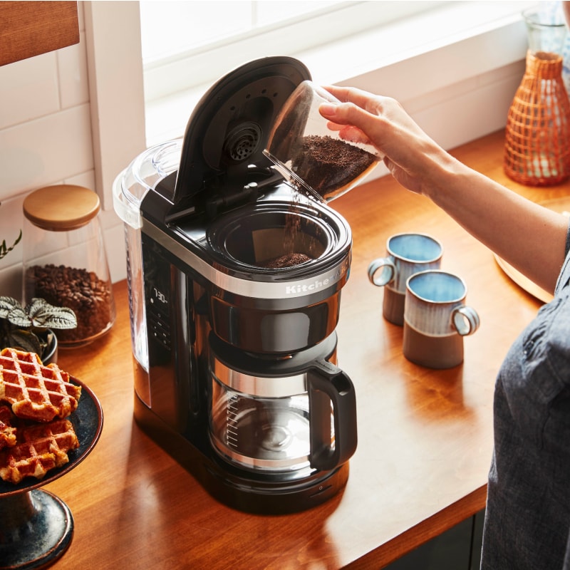 Person making coffee with a KitchenAid® Drip Coffee Maker Person making coffee with a KitchenAid® Drip Coffee Maker